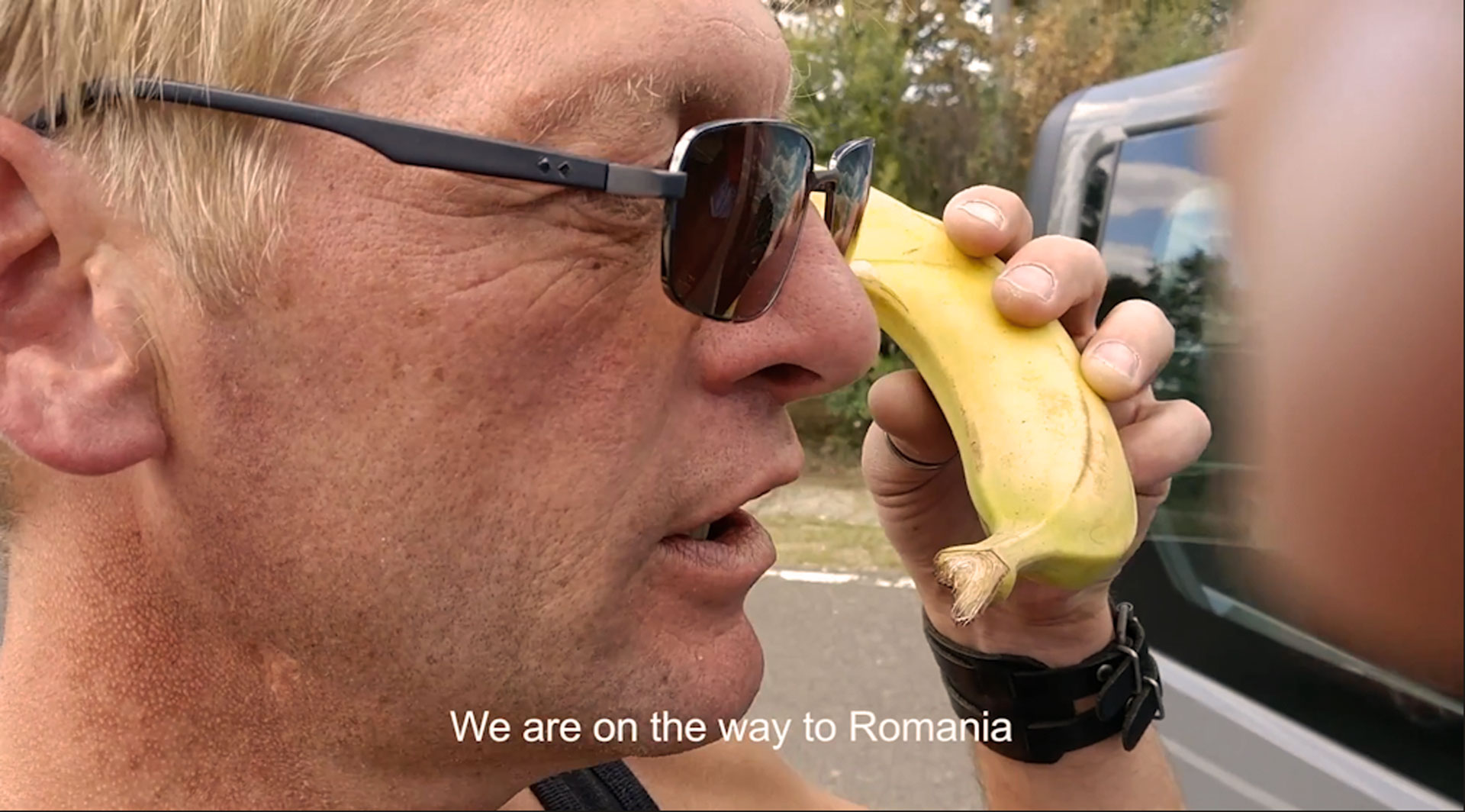 Steve making a phone call with a banana