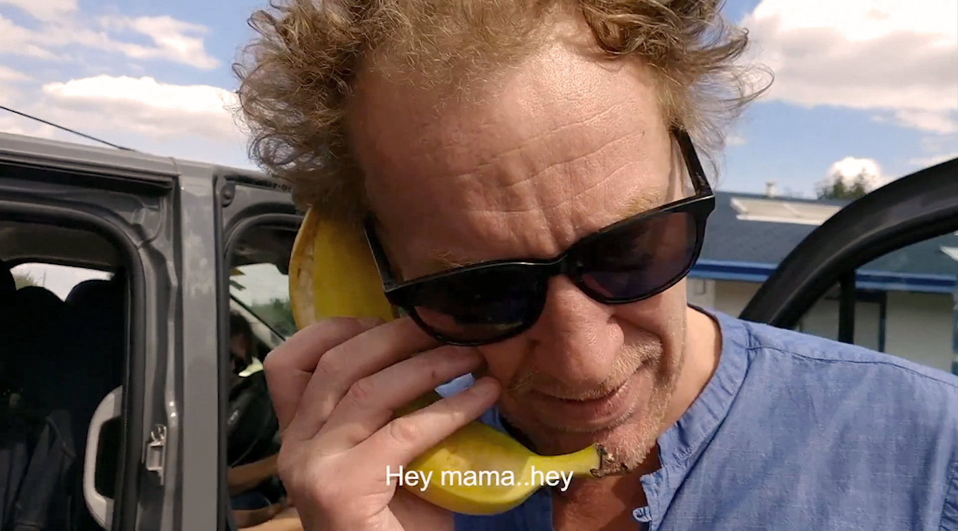 Jochen making a phone call with a banana